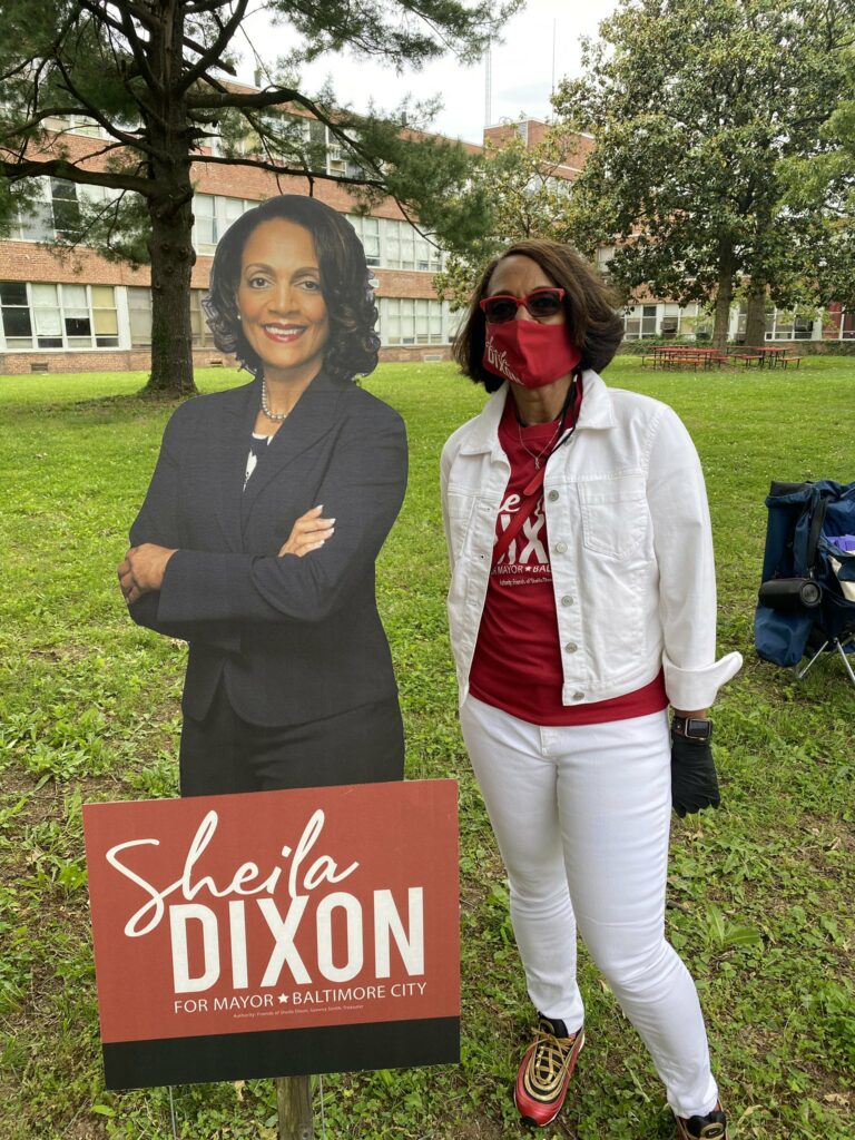 A live interview with Sheila Dixon, a Democratic mayoral candidate, was abruptly interrupted when an unidentified person began throwing objects and heckling her while she answered questions. 