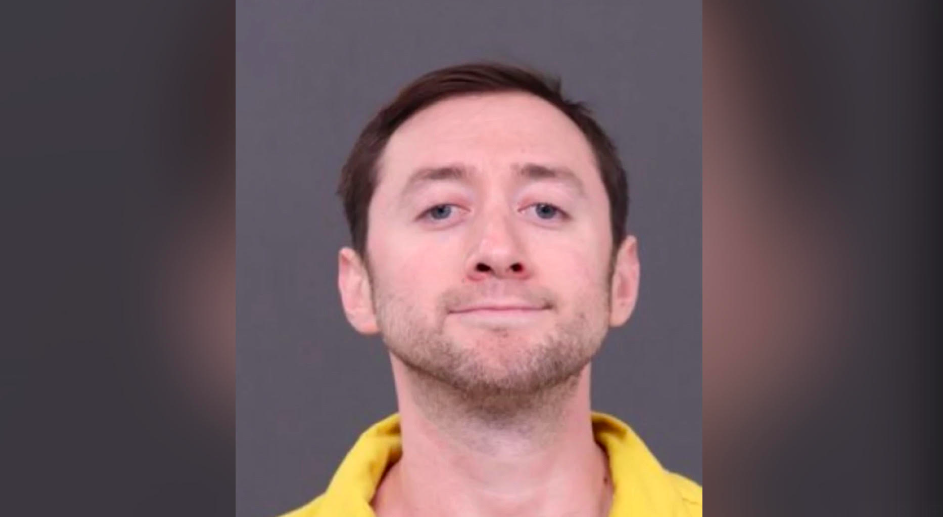 A man was arrested at a National Guard base after allegedly decapitating his father and posting a video online with the severed head amid a political rant.