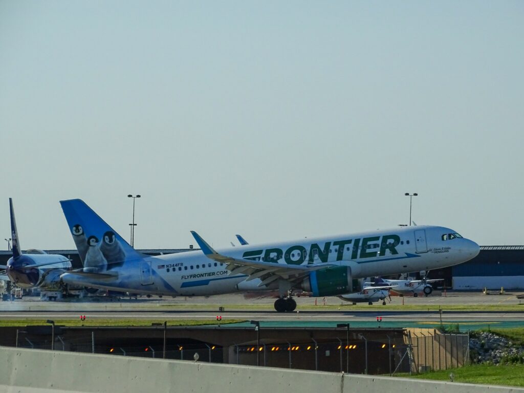 A passenger was injured at Charlotte Douglas International Airport when a Frontier Airlines plane had to be evacuated because of a strong odor.